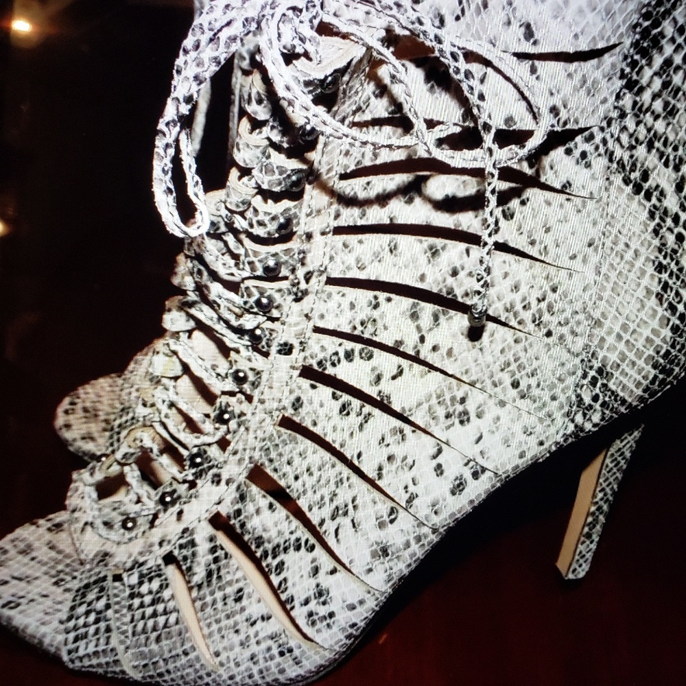 Vince Camuto snakeskin lace up booties